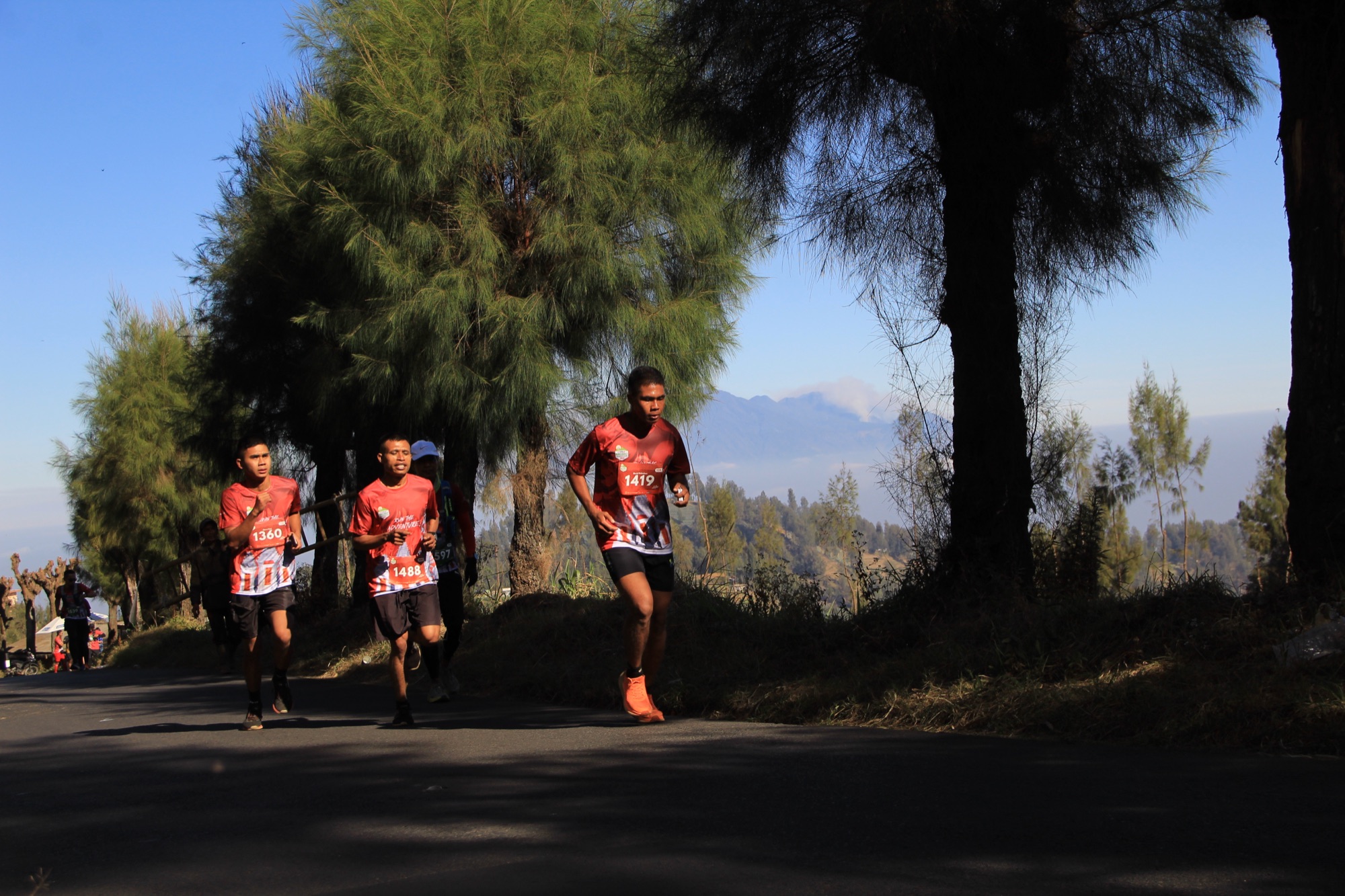 Runners on volcanic trail at Bromo