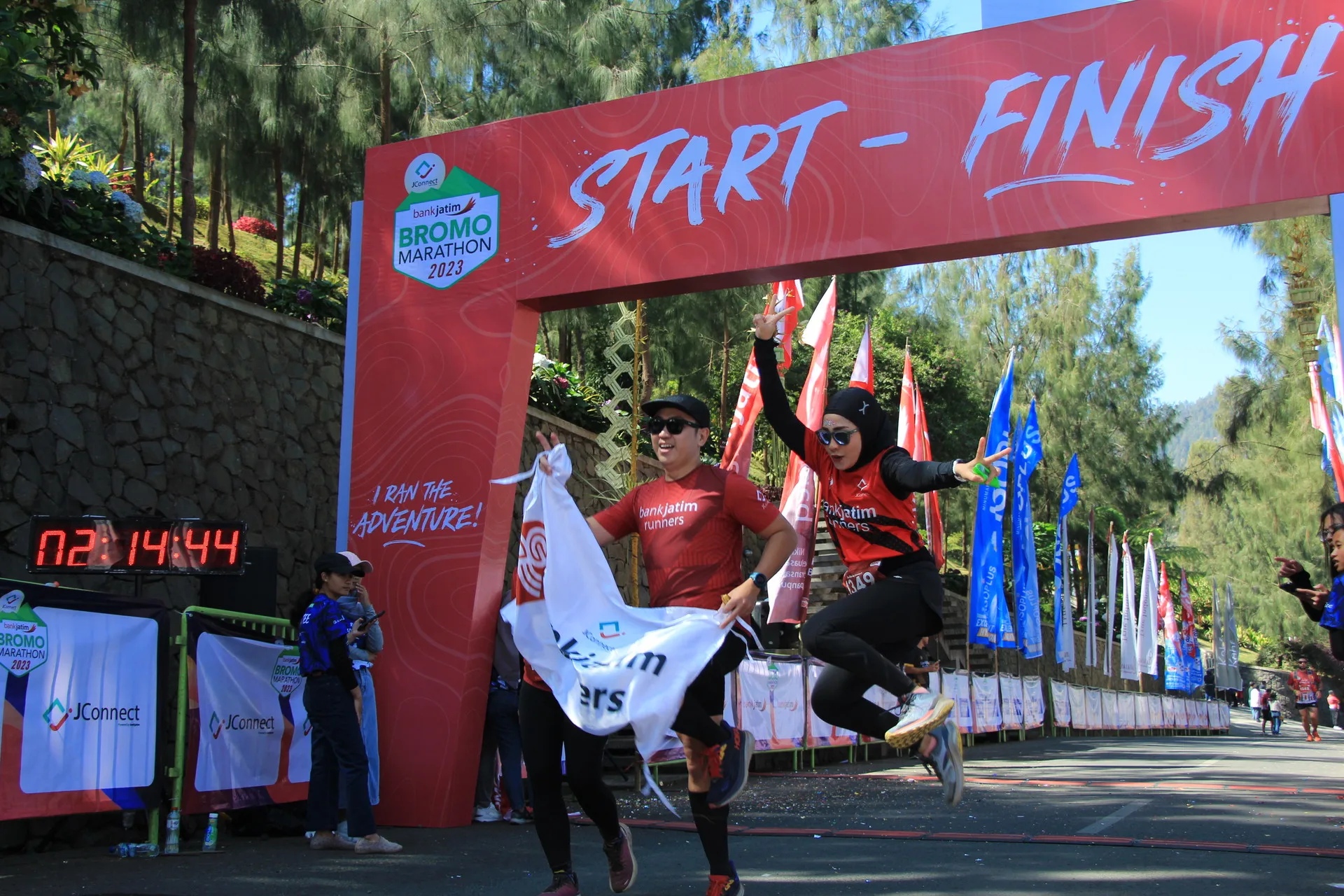 Runners on volcanic trail at Bromo